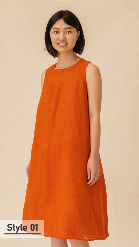 green emerald velvet dress Kaida Slinky Maxi Dress with Hardware / Burnt Orange | Meshki main image 1