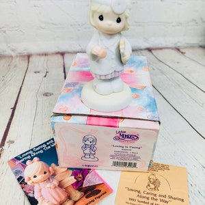 Precious Little Moments &quot;Loving Is Caring&quot; 320579 Blonde Nurse Figurine 1997