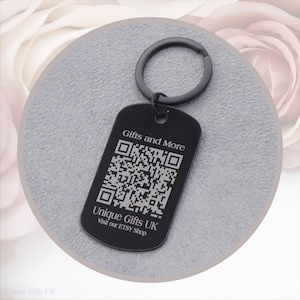 May include: Black rectangular keyring with a QR code and the text "Gifts and More" and "Unique Gifts UK Visit our Etsy Shop". The keyring has a black ring attached.