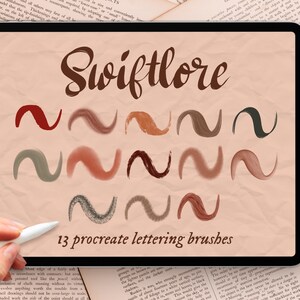 May include: A digital tablet screen displaying a set of 13 Procreate lettering brushes called "Swiftlore". The brushes are shown as wavy lines in various shades of red, brown, green, and gray against a beige background.
