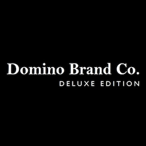 May include: White text on a black background reads "Domino Brand Co." in a serif font, with "DELUXE EDITION" below in a smaller font. The text is centrally aligned.