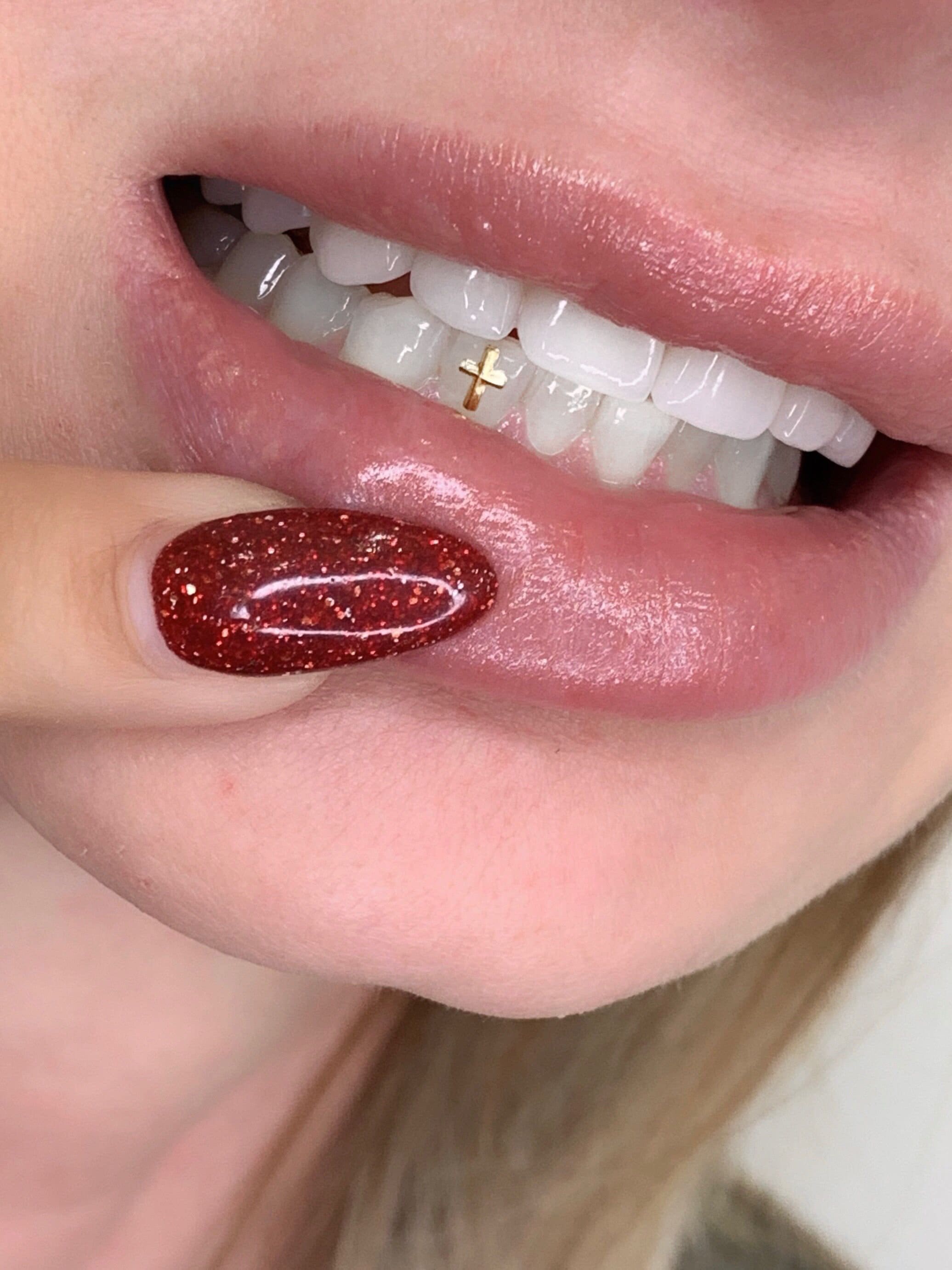 Gold cross tooth on sale gem