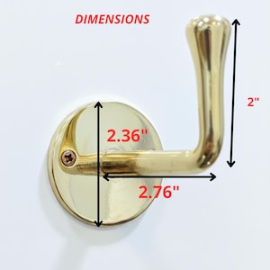 solid brass hook, brass towel hook, unlacquered brass, brass wall hooks, brass hat hooks, brass clothes hanger, brass coat hook, vintage style hooks, luxury brass hooks, purse hook, coat hook, luxury hardware, brass hardware, modern minimalist brass hooks, brass wall hook, rustic brass hooks, decorative metal hook, artisan brass wall hook, bathroom brass hook, polished brass hooks, set of 3 hooks, unique handcrafted hooks, buddy hooks, coat hooks, bathroom towel hook, antique brass wall hook.
