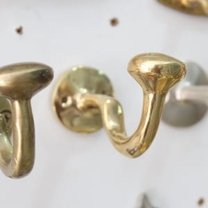 Rustic Wall Mounted Brass Hooks for Bathroom and Coat Hanging, Handcrafted with an Unlacquered Finish for a Timeless Look