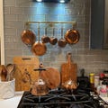 Unlacquered Solid Brass Pot Rail with S Hooks: Custom Kitchen Pot & Pan Hanging Rack. product logo