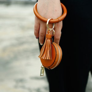 Vegan Leder AirPods Fall Armband Beutel Tasche Charme Armband Armreif Quaste Schlüsselanhänger Schlüsselanhänger Münze Beutel Geschenk