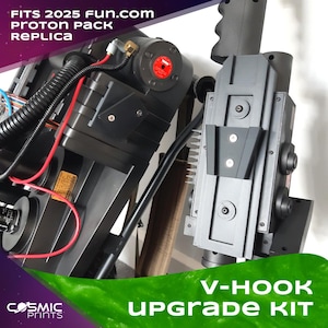 May include: A detailed replica of a Proton Pack, featuring black and gray components with red wiring and metallic accents. The image includes text that reads "FITS 2025 FUN.com Proton Pack Replica" and "V-HOOK UPGRADE KIT".