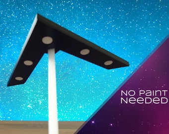 May include: A black, right-angled shelf with white circular lights is supported by a white pole. The text "NO PAINT NEEDED" is visible in the lower right corner. The background is a blue gradient with white specks.