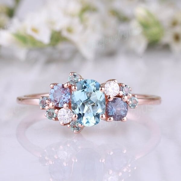 Akvamarin förlovningsring unik oval slipad ring roséguld vigselring alexandrit moissanit klusterring naturinspirerad löfte ring