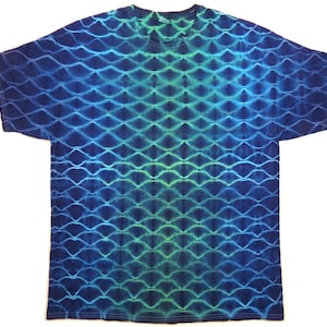 May include: A blue and green tie-dye t-shirt with a wavy pattern.