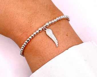 Sterling Silver Beaded Bracelet with a Angel Wing charm | Sterling Silver Beaded Stretch Stacking Layering Bracelet Set
