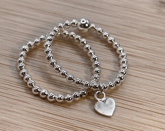 Sterling Silver Stacking Beaded ring with heart charm. Sterling silver beaded stretch ring. Sterling silver stacking ring. Beaded Ring,