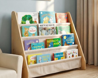 モンテッソーリ教育にインスパイアされた、リネンスリングと子供に安全なデザインを備えた無垢材の本棚