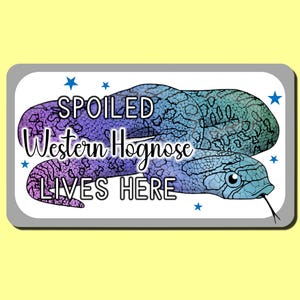 May include: A sticker featuring a blue, purple and green Western Hognose snake with the text "Spoiled Western Hognose Lives Here" and blue stars.