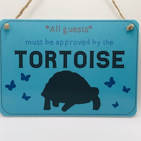All Guests Must Be Approved By the Tortoise sign