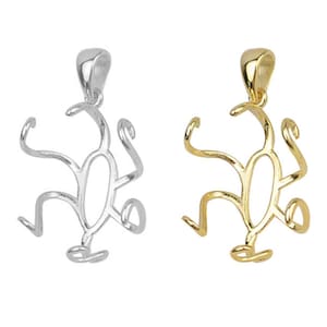 May include: Two silver and gold pendant bails with a delicate, intricate design. The bails are shaped like a stylized flower with six petals and a round centre hole.