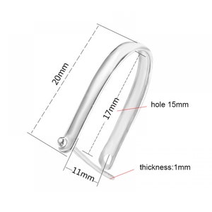 May include: Silver metal ring with a 1.5 inch diameter hole. The ring is 11 mm wide and 2 inches long. The ring is 1 mm thick.