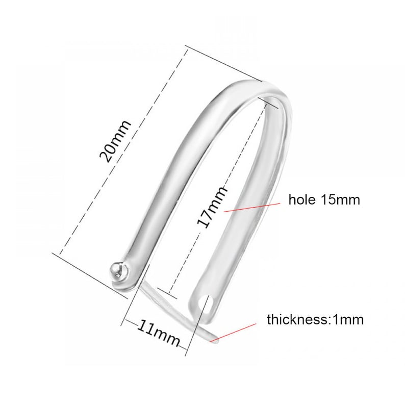 May include: Silver metal ring with a 1.5 inch diameter hole. The ring is 11 mm wide and 2 inches long. The ring is 1 mm thick.