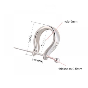 May include: Silver earring finding with a 7 mm diameter hoop, 4 mm post, and 5 mm hole. The finding is 9 mm tall and 0.5 mm thick.