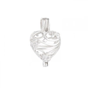May include: A silver heart-shaped charm with a delicate floral design. The charm is open and has a small loop at the top for attaching to a necklace or bracelet.