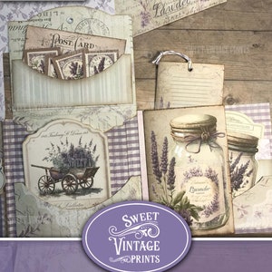May include: A vintage lavender folio junk journal kit with a purple and white checkered pattern, a postcard, a lavender jar, and a wheelbarrow with lavender flowers. The kit includes the text "Vintage Lavender Folio" and "Junk Journal Folio".