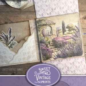 May include: A purple and white junk journal folio with a vintage lavender design. The folio features a watercolor illustration of a stone cottage with lavender bushes and a stone path. The text "Vintage Lavender Folio" and "Junk Journal Folio" is printed on the front of the folio.