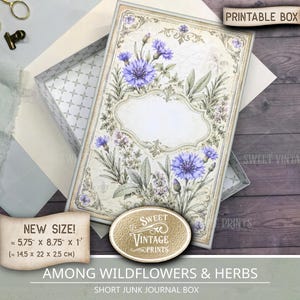 May include: A rectangular printable box featuring a botanical illustration of purple cornflowers and green herbs on a cream background. The box lid has an ornate central frame and measures 14.5 cm by 22 cm by 2.5 cm in size.