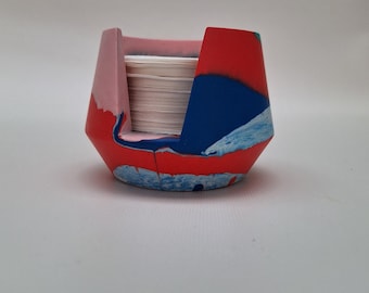 Soporte para papel Aeropress en rojo, azul, rosa y turquesa. Jesmonite