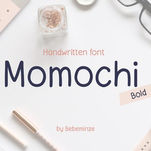 May include: Handwritten font "Momochi" in bold, with the text "Handwritten font" and "by Bebeminze" in a smaller font. The image is set against a white background with various office supplies, including a notebook, a pen, a pair of glasses, and a watch.
