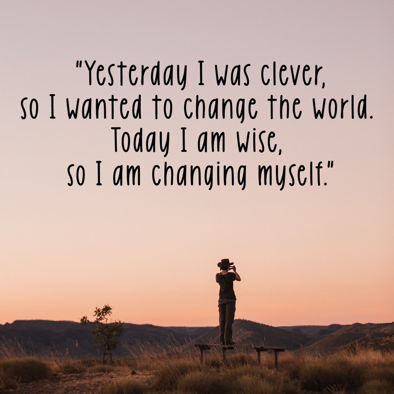 May include: A person standing on a wooden bench overlooking a valley at sunset. The quote "Yesterday I was clever, so I wanted to change the world. Today I am wise, so I am changing myself." is displayed in the image.