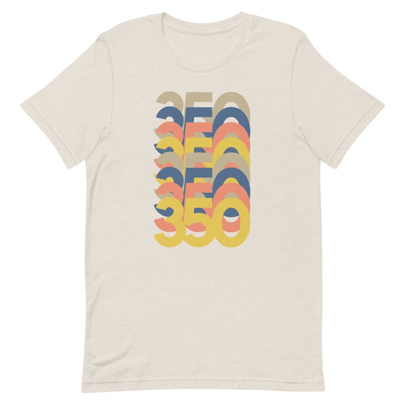 May include: A beige t-shirt with a graphic design of the number 350 repeated in a stacked, layered pattern. The numbers are in shades of yellow, orange, pink, and blue.