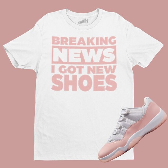 pink jordan 11 lows