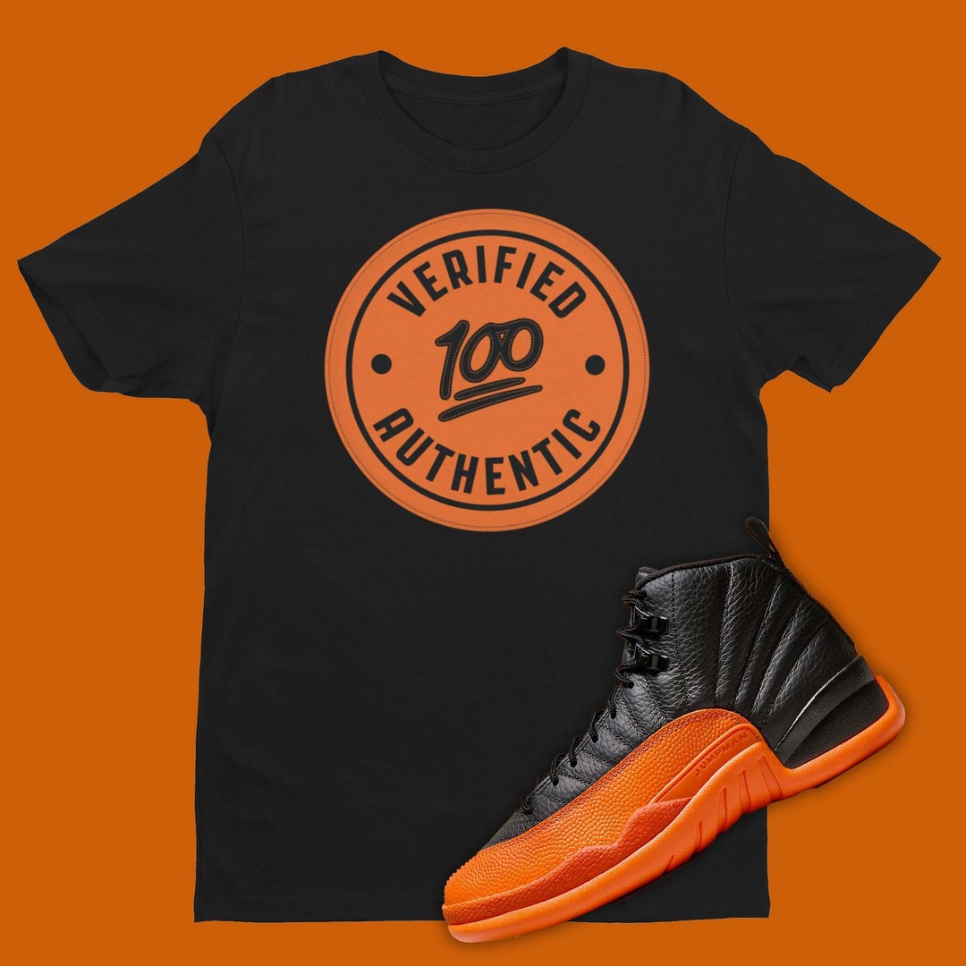 Black and orange jordan shirt sale