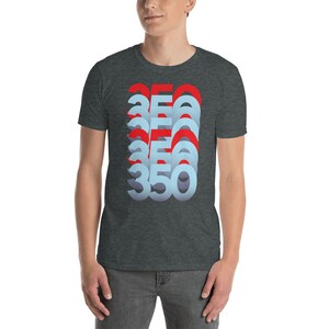 May include: A dark heather grey t-shirt featuring a graphic design of the number 350 repeated in a stacked, layered, and slightly offset pattern. The numbers are in a blue and red colour scheme.