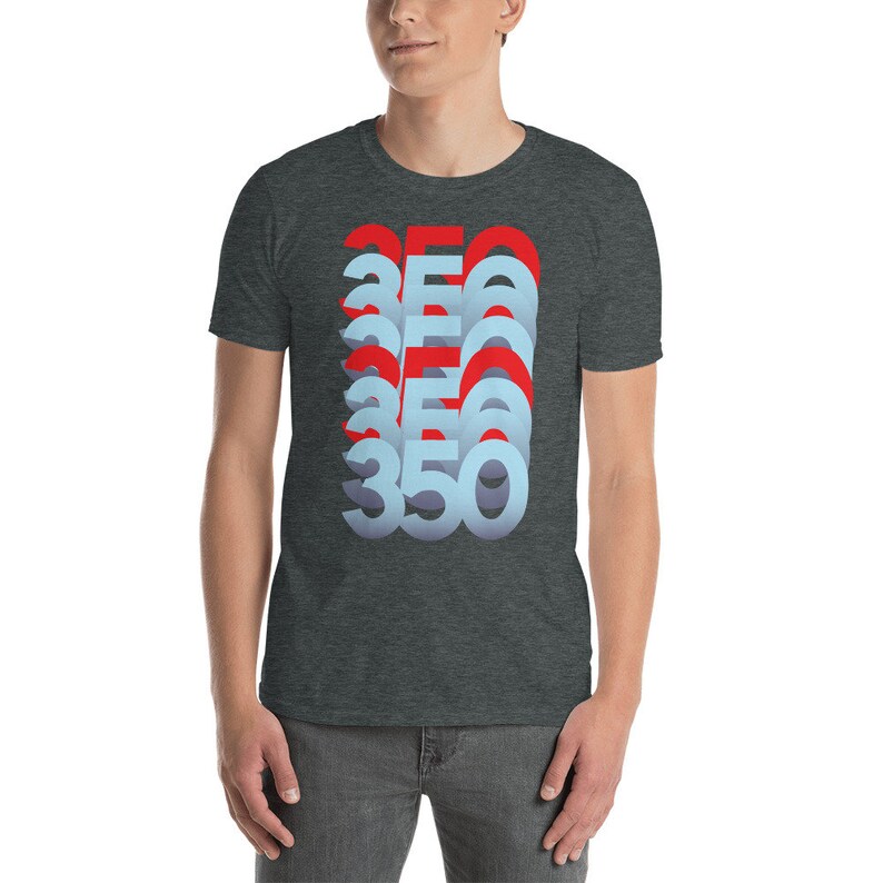 May include: A dark heather grey t-shirt featuring a graphic design of the number 350 repeated in a stacked, layered, and slightly offset pattern. The numbers are in a blue and red colour scheme.