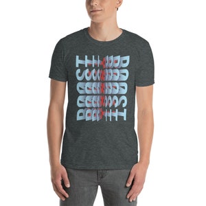 May include: A dark heather grey t-shirt with a blue and red graphic that reads "The Good, The Bad, The Scariest".
