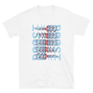May include: White t-shirt with the text "The Best" printed in blue and red letters, with the letters stacked on top of each other and slightly offset.