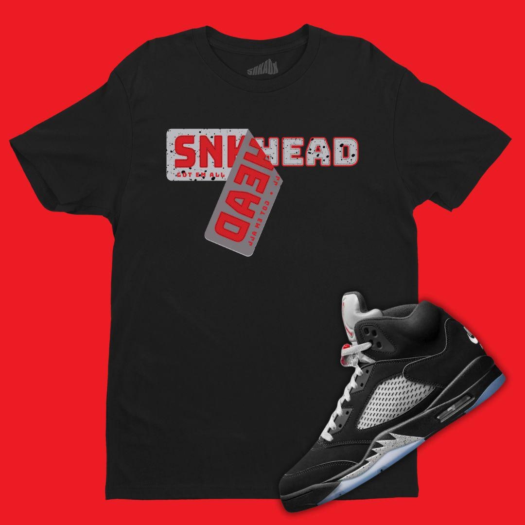 silver and black jordan shirt