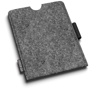 May include: A grey felt tablet sleeve with a black pen holder. The sleeve is rectangular with a curved top cutout. A small black tag with the text "EMERSON GRAY" is attached to the bottom left corner.