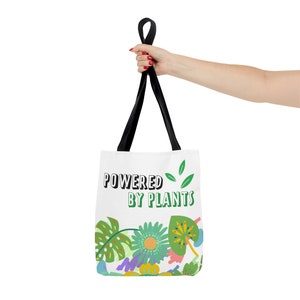 Botanical Tote Bag (AOP) Powered by Plants green leafs.