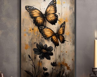 May include: A painting of two golden butterflies with black markings on a white background with black splatters of paint. The butterflies are flying over a black flower with white accents.