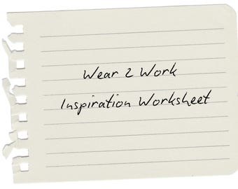 May include: A piece of lined paper, torn along the left edge, with the handwritten text "Wear 2 Work Inspiration Worksheet". The paper is off-white with horizontal lines, and the text is in black ink.