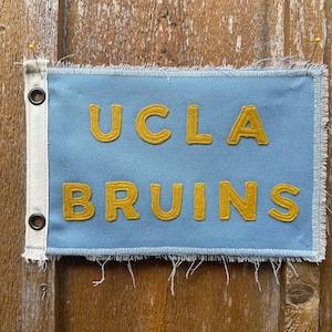 Bannière bleu clair d'inspiration vintage du camp des Bruins de l'Ucla, décoration murale Go Bruins de l'Université de Californie à Los Angeles