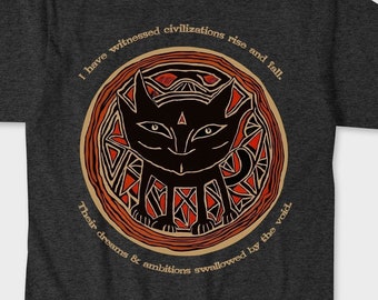 May include: Dark heather grey t-shirt with a black cat illustration inside a circle with orange and red accents. The text "I have witnessed civilizations rise and fall. Their dreams & ambitions swallowed by the void." is printed on the shirt.