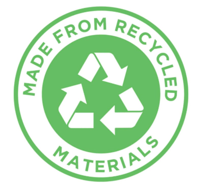 May include: A circular green and white graphic with the text "MADE FROM RECYCLED MATERIALS". The design features a recycling symbol in the center, composed of three white arrows in a circular motion.