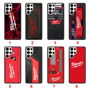 May include: A collection of eight phone cases with a black border and a red and black design. Each case features the "Milwaukee" logo and various designs, including a fuel gauge, a radio, and a digital clock.
