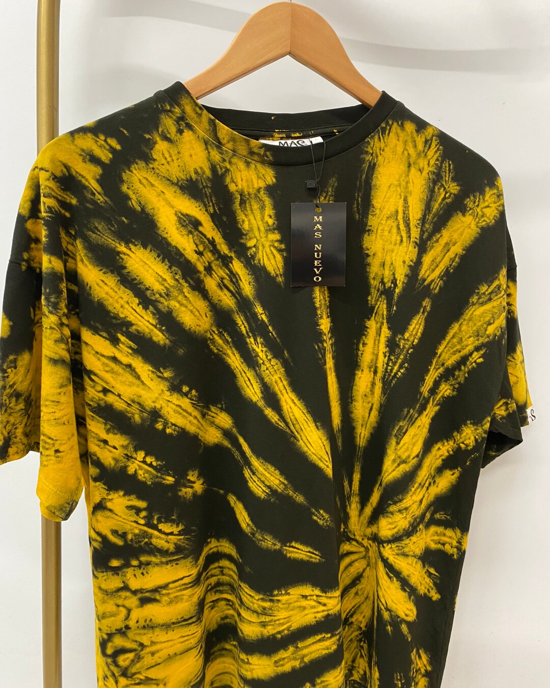 tie dye on yellow shirt
