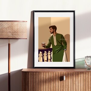 May include: A framed illustration of a man in a green long-sleeved shirt and pants standing on a balcony, holding a glass of liquid. The background is a light beige color.