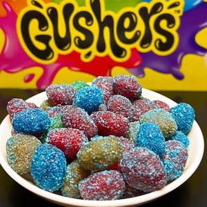 Flavored gushers . Cotton candy gushers. Extreme sour blue raspberry gushers. Candy