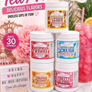 May include: Five white plastic jars of Queen B's Designs loaded tea mix in flavors Pineapple Upside Down, Watermelon Wishes, Cotton Candy Crush, Orange Creamsicle, and Pretty In Pink. Each jar features a colorful label with text and graphics.